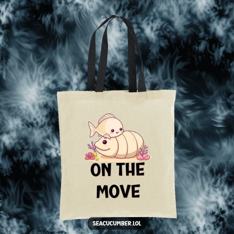 Funny small fish playfully nudging a rolling sea cucumber on a durable and stylish tote bag.